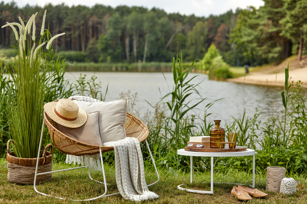 Wohnen in der Natur – Das Gartenhaus mit Wintergarten - Die Haus Seite